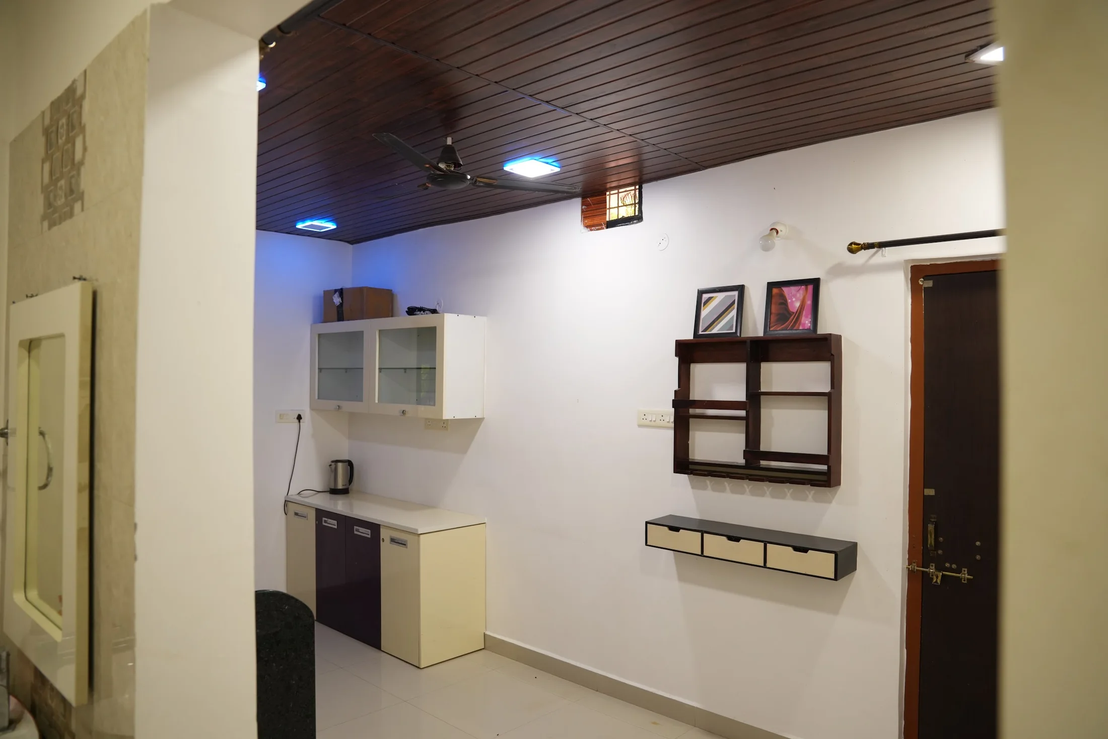 Bungalow kitchenette at DS Agro Tourism & Resort. A compact preparation area within the bungalow.