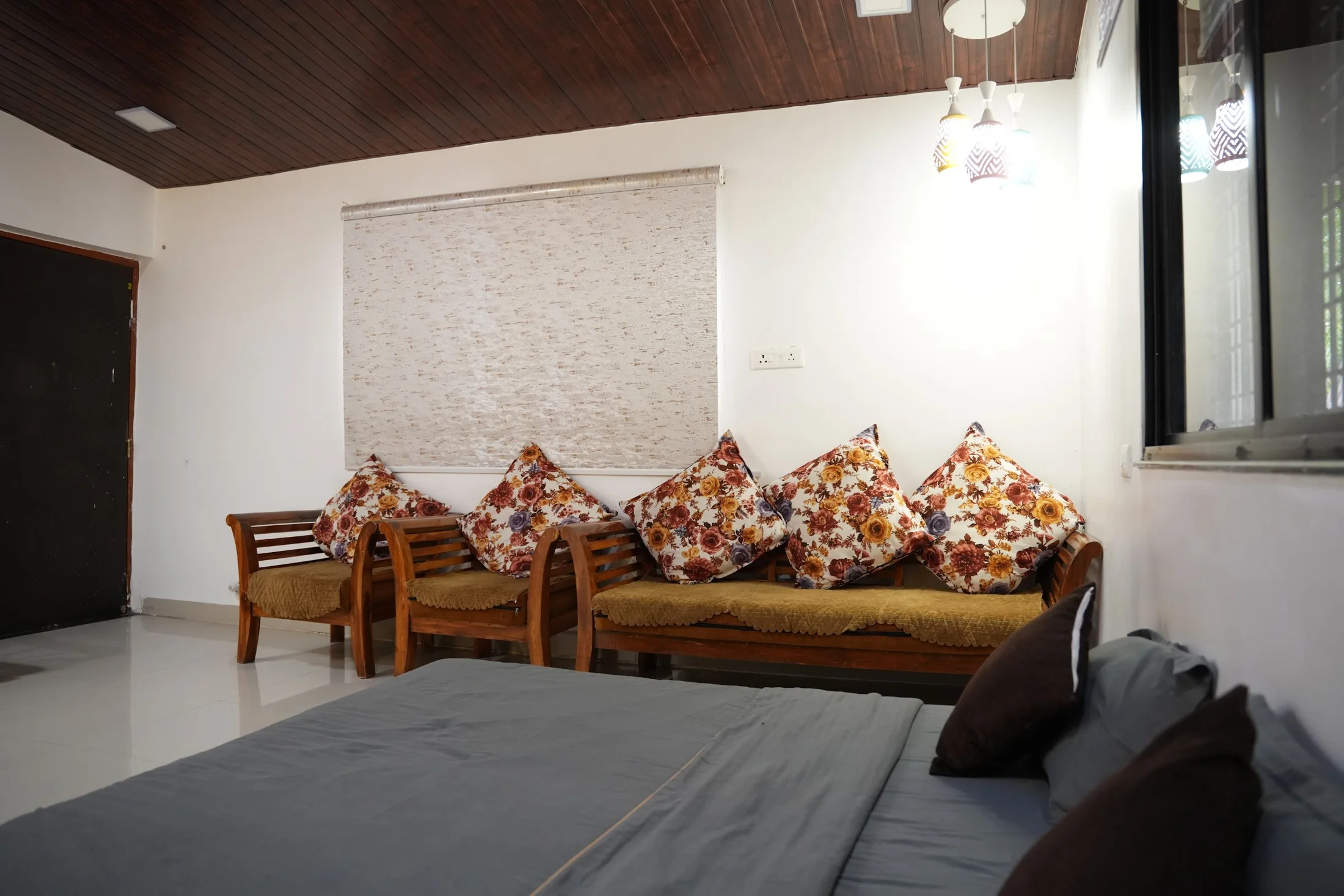 Bungalow lounge at DS Agro Tourism & Resort. Comfortable seating for time together indoors.