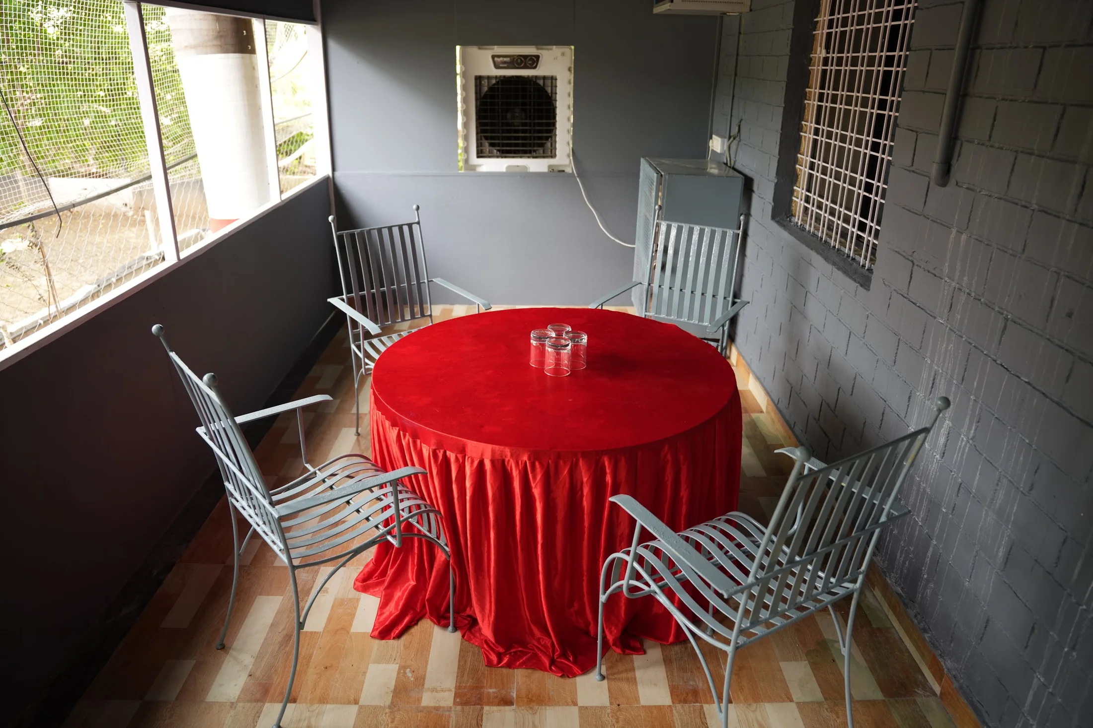 Private veranda at DS Agro Tourism & Resort. An outdoor sitting area beside the bungalow.