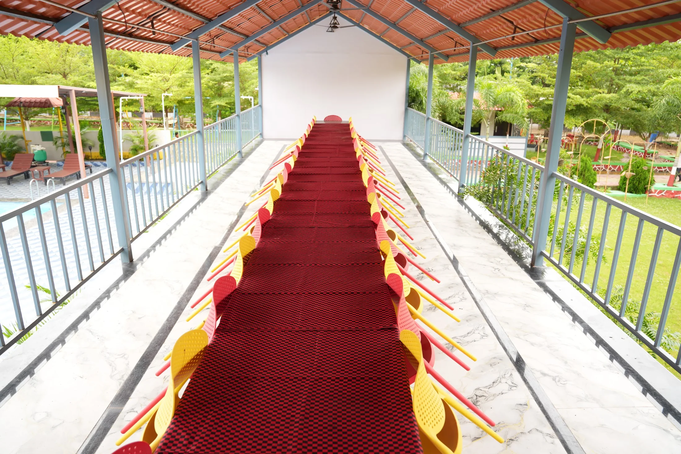 Long table setup at DS Agro Tourism & Resort. A covered, group-sized table arrangement at the resort.