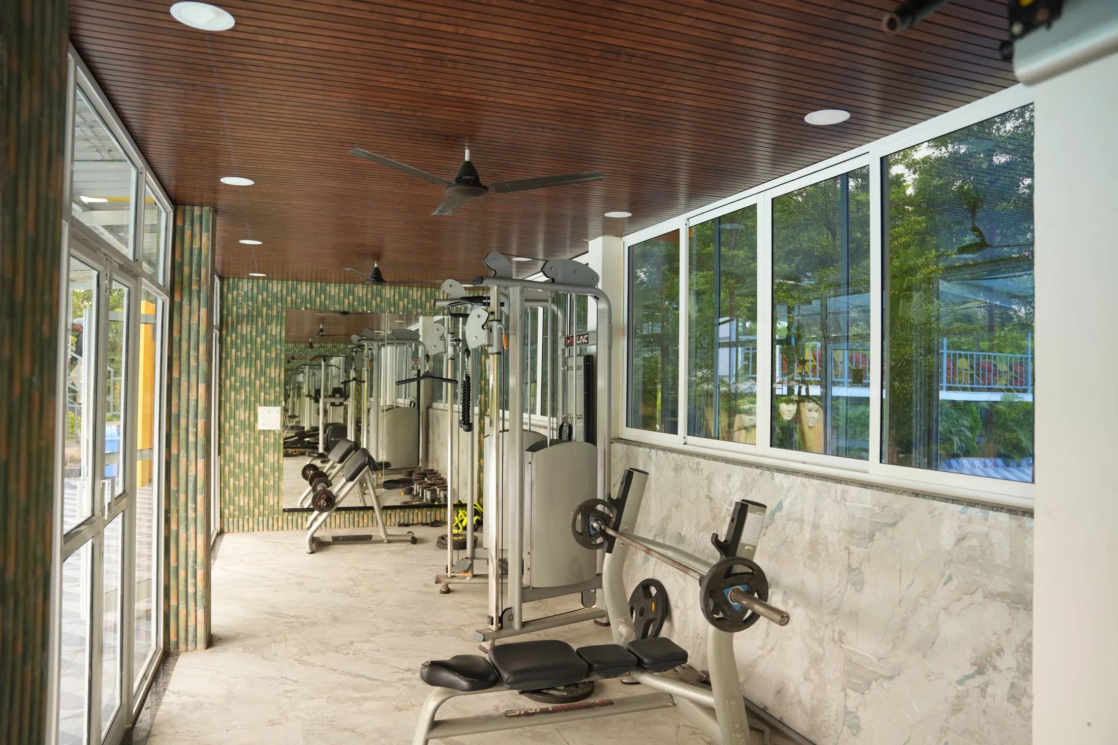 Resort gym. The actual gym and its exercise equipment, overlooking the resort.