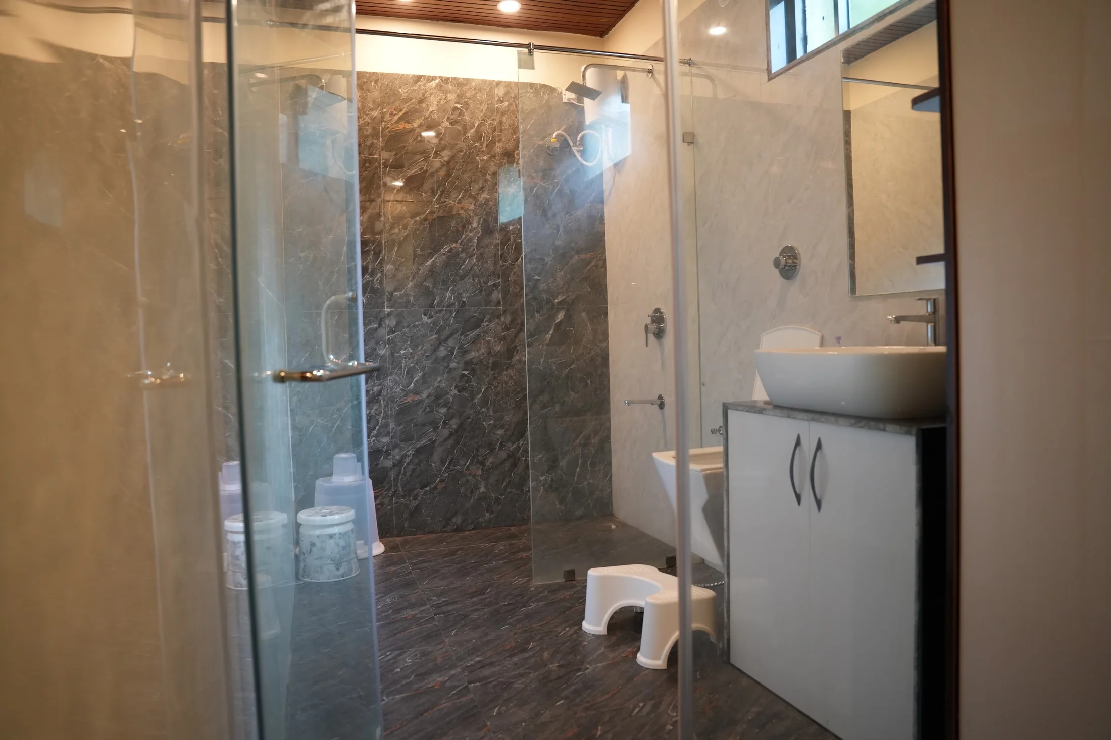 Super Deluxe bathroom at DS Agro Tourism & Resort. The attached bathroom serving the Super Deluxe room.